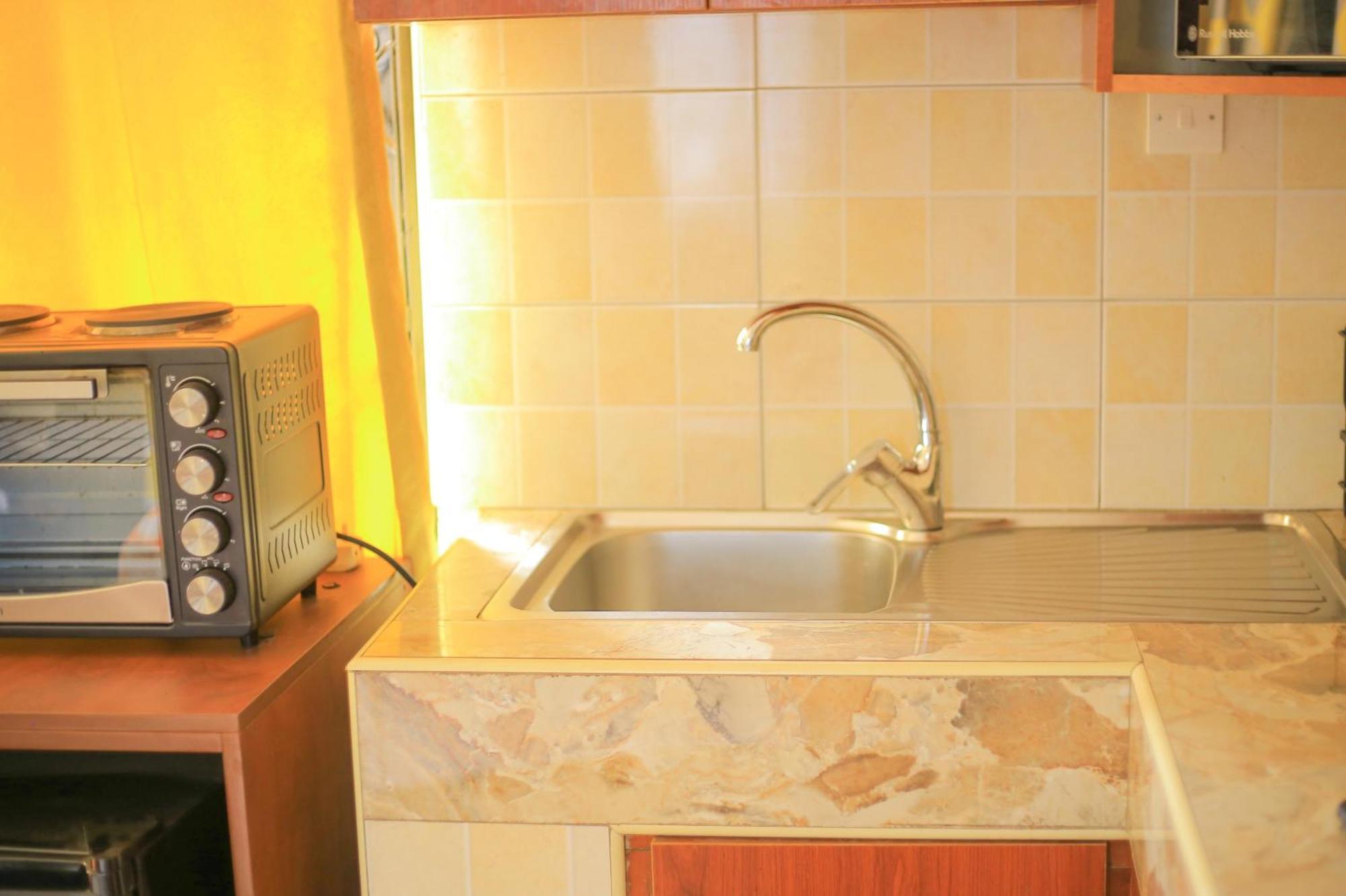 Rustic Gardens Bed & Breakfast Kitunzi Lungujja Kampala Buitenkant foto